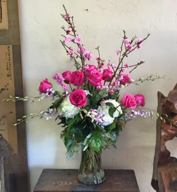 hot pink roses in a vase