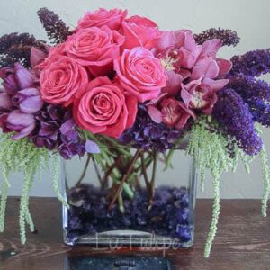 pink and purple roses in a vase