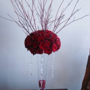 rede roses in a vase tall