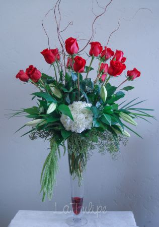 tall vase with red roses