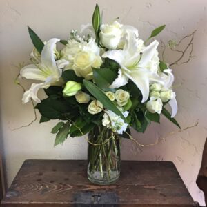 lilies and roses in a vase