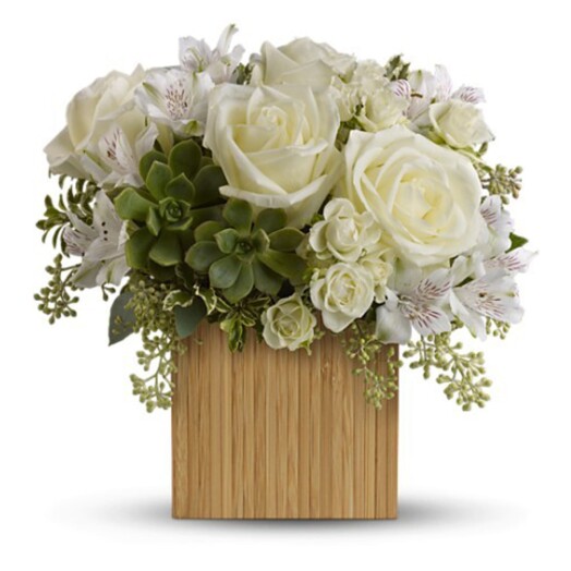 roses and alstroemeria in a bamboo vase