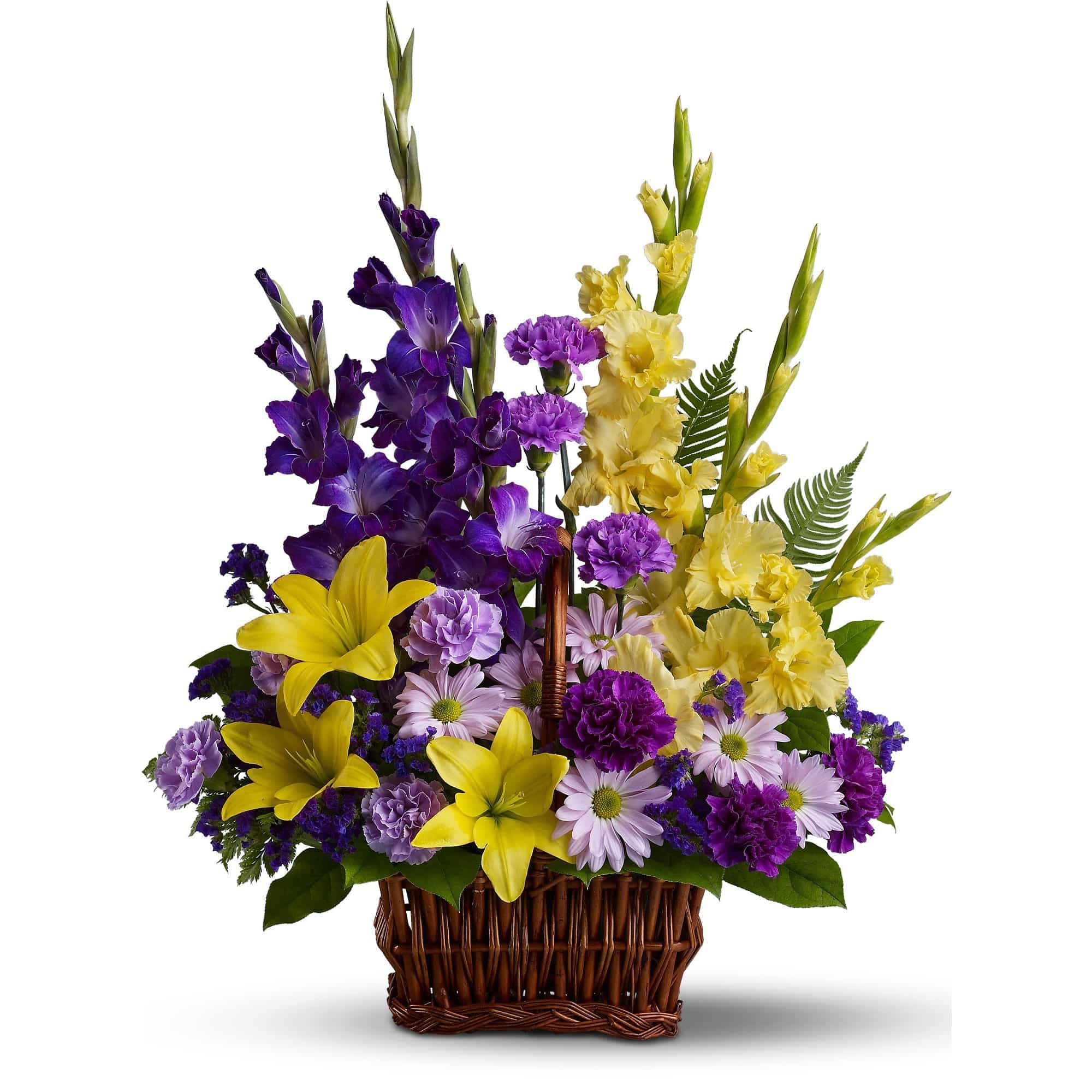 unique sympathy basket accents yellow lilies and purple gladioli with tropical greens and ferns