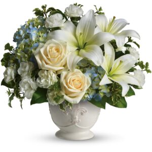 blue hydrangeas, crème roses, white miniature carnations, fragrant white asiatic lilies