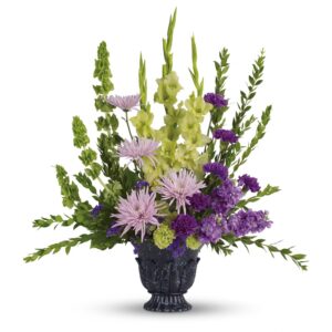 gladioli, lavender stock, green carnations, purple carnations, lavender spider chrysanthemums, bells of Ireland