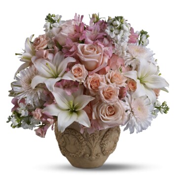 hydrangea, roses and alstroemeria are mixed with white flowers