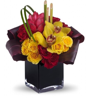 Yellow cymbidium orchids, red ginger, red and yellow spray roses