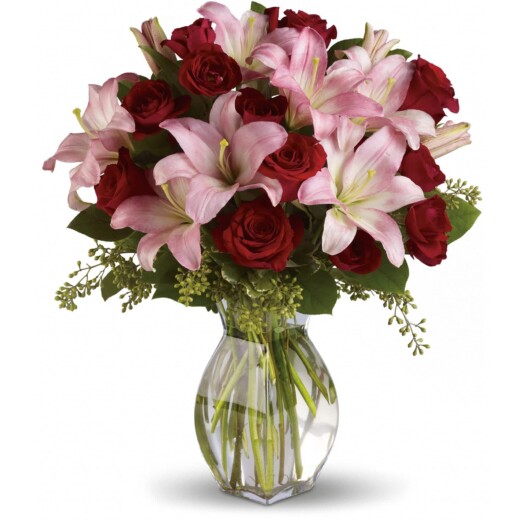 pink and red flowers in a vase