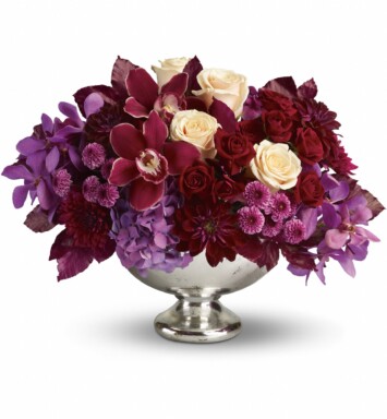 red cymbidium orchids, purple mokara orchids, lavender hydrangea, crÃ¨me roses, dark red spray roses, burgundy dahlias, purple and lavender chrysanthemums
