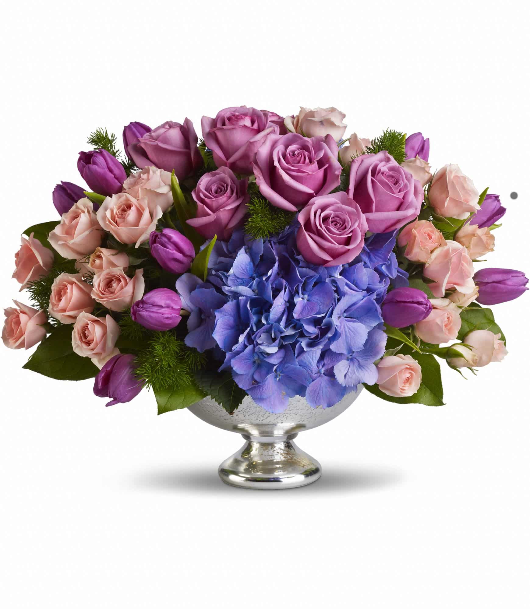 blue hydrangea with happy purple tulips and luxurious lavender and pink roses centerpiece